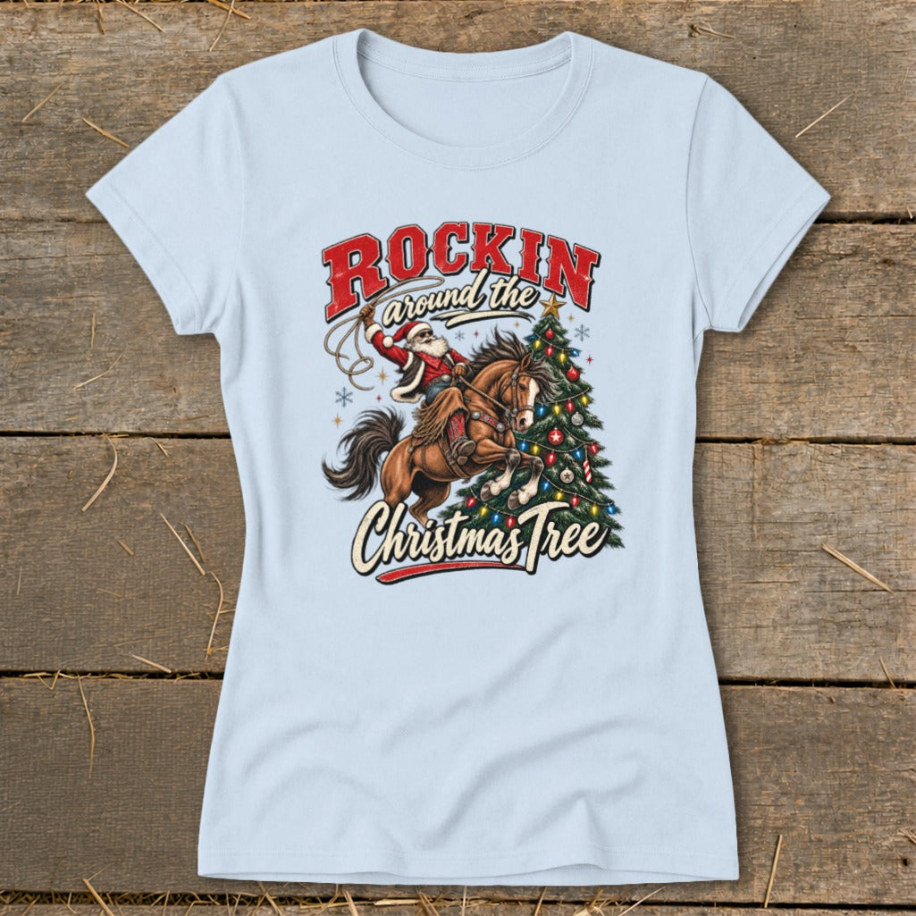 Light blue t-shirt with "Rockin Around the Christmas Tree" graphic featuring Santa on a horse.