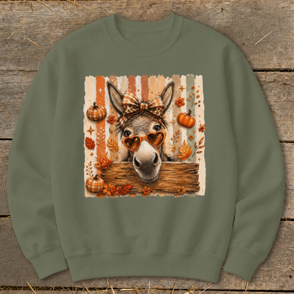 Crewneck sweatshirt with a cute donkey wearing heart sunglasses and a plaid bow.