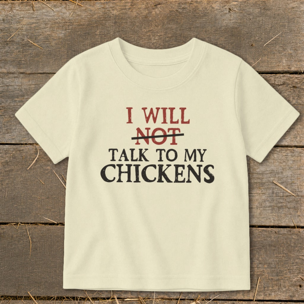 Light yellow t-shirt with "I will NOT talk to my chickens" graphic.