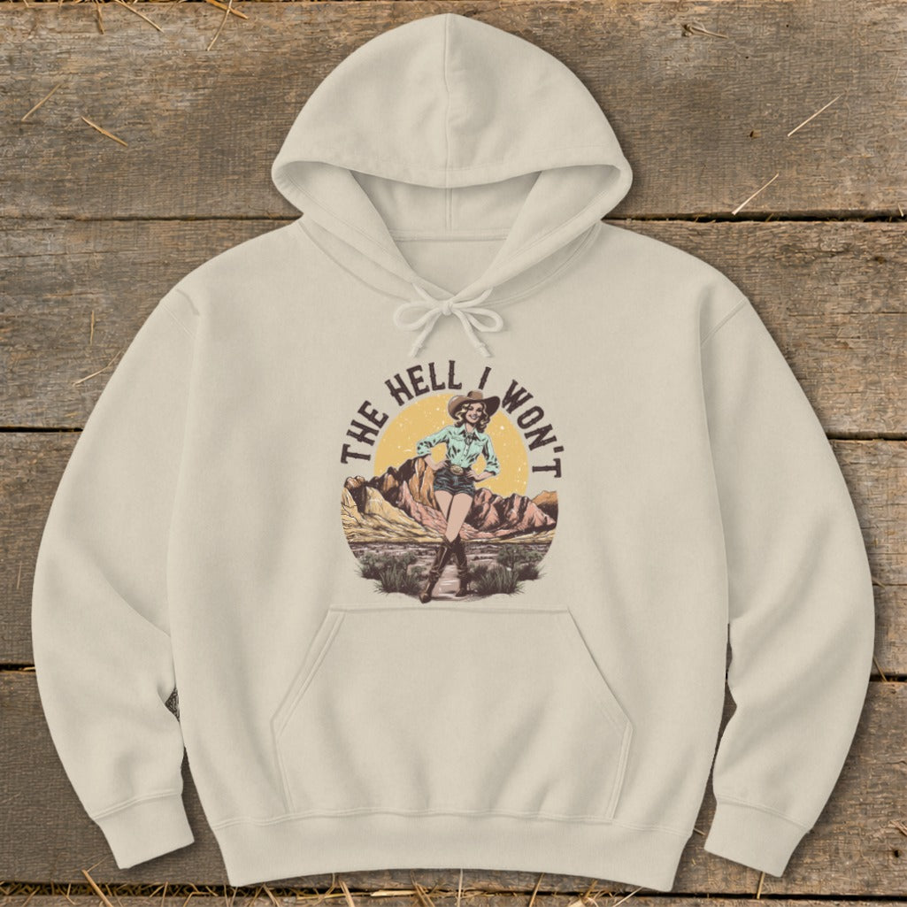 Light beige hoodie with distressed desert graphic and text "The Hell I Won't".