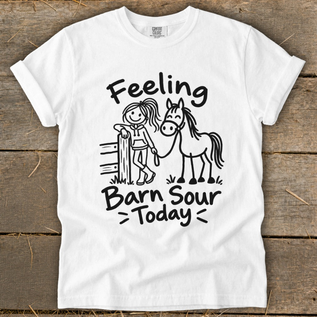 White t-shirt with a line drawing of a girl and a horse, text reads "Feeling Barn Sour >Today<".