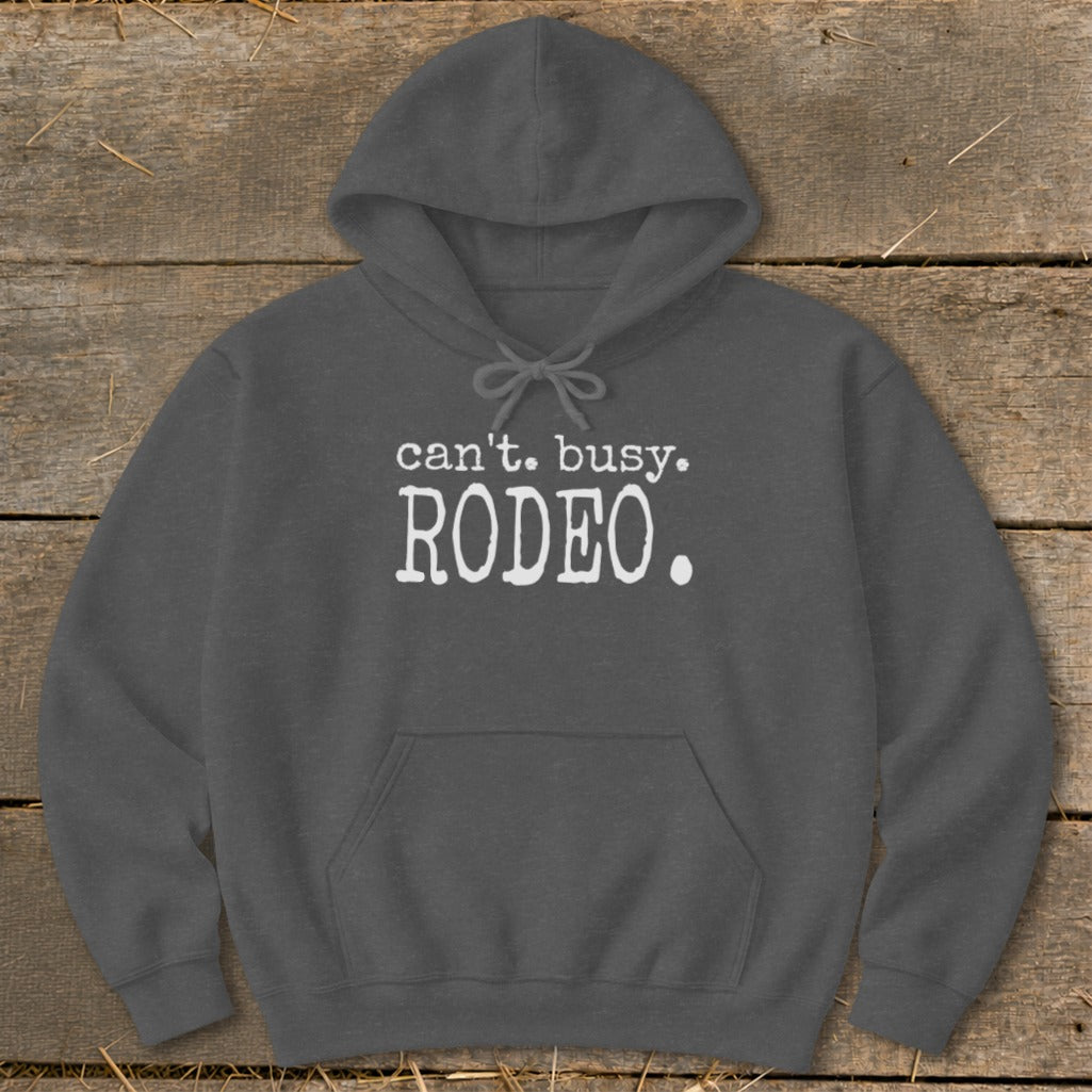 Dark gray hoodie with white text "can't. busy. RODEO."