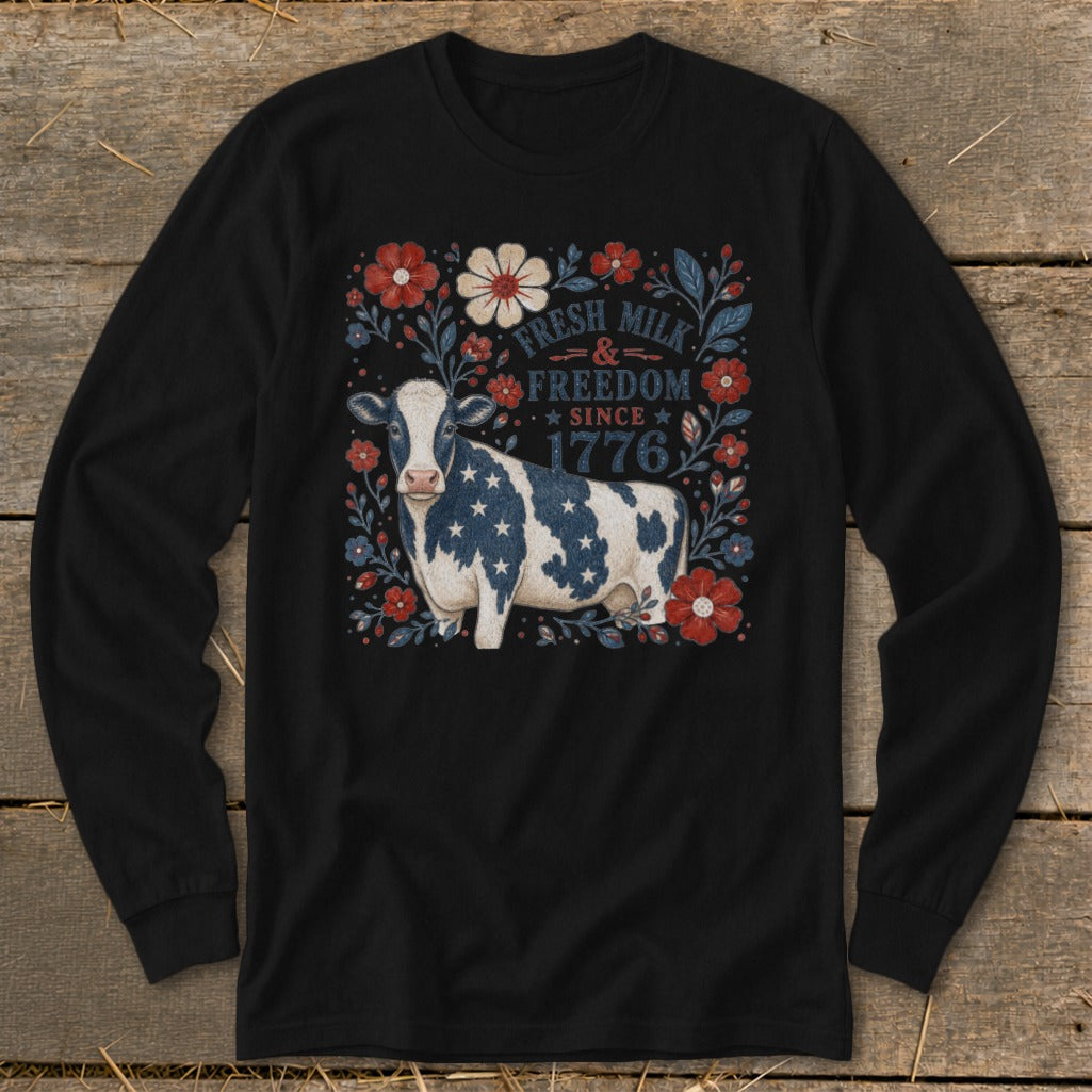 Black long-sleeve shirt with a cow graphic featuring stars and stripes and text.