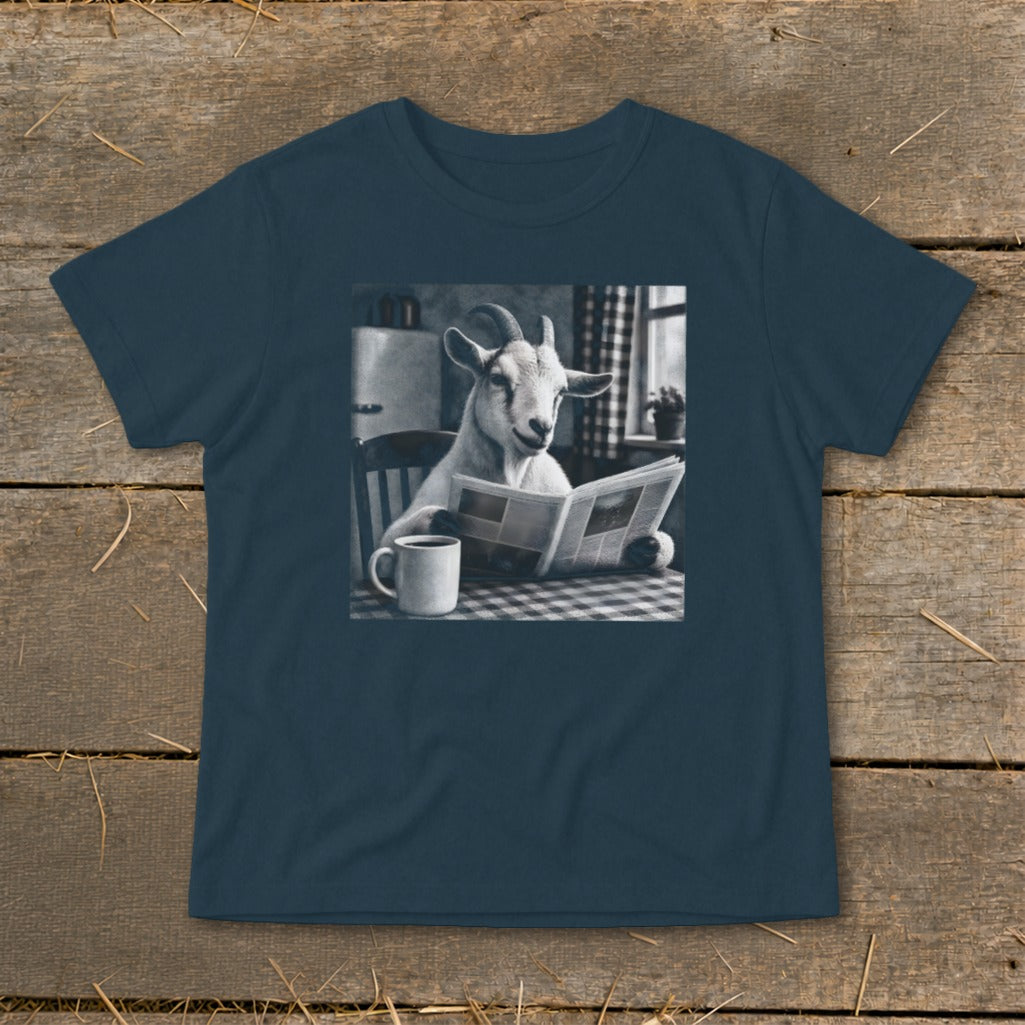 Dark blue short-sleeved t-shirt featuring a black and white graphic of a goat reading a newspaper at a table.