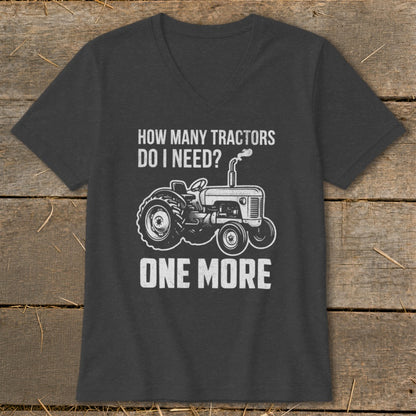 Dark gray t-shirt with white text and tractor graphic: "HOW MANY TRACTORS DO I NEED? ONE MORE"
