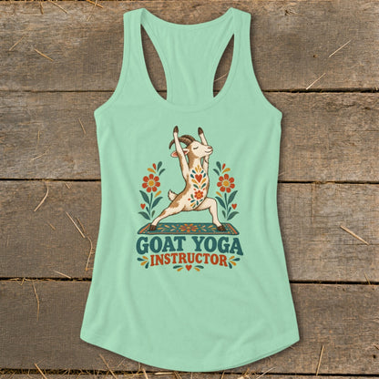 Goat in yoga pose on mat with text "GOAT YOGA INSTRUCTOR" surrounded by flowers.
