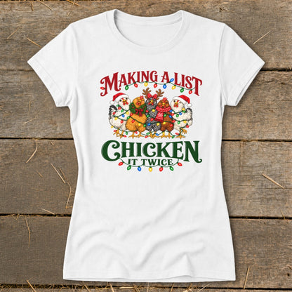 White t-shirt with chickens in Santa hats and Christmas lights, "Making a list, Chicken it twice."