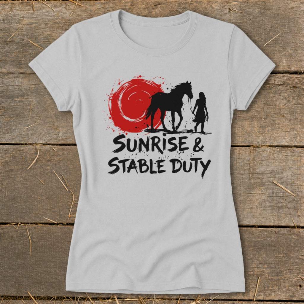 Grey t-shirt graphic with a horse and girl silhouette and text "Sunrise & Stable Duty".
