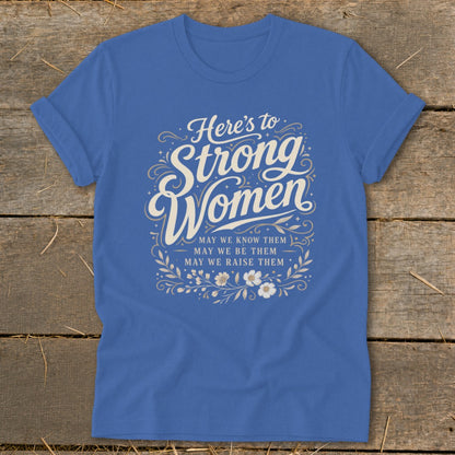Blue t-shirt with "Here's to Strong Women" and floral design.