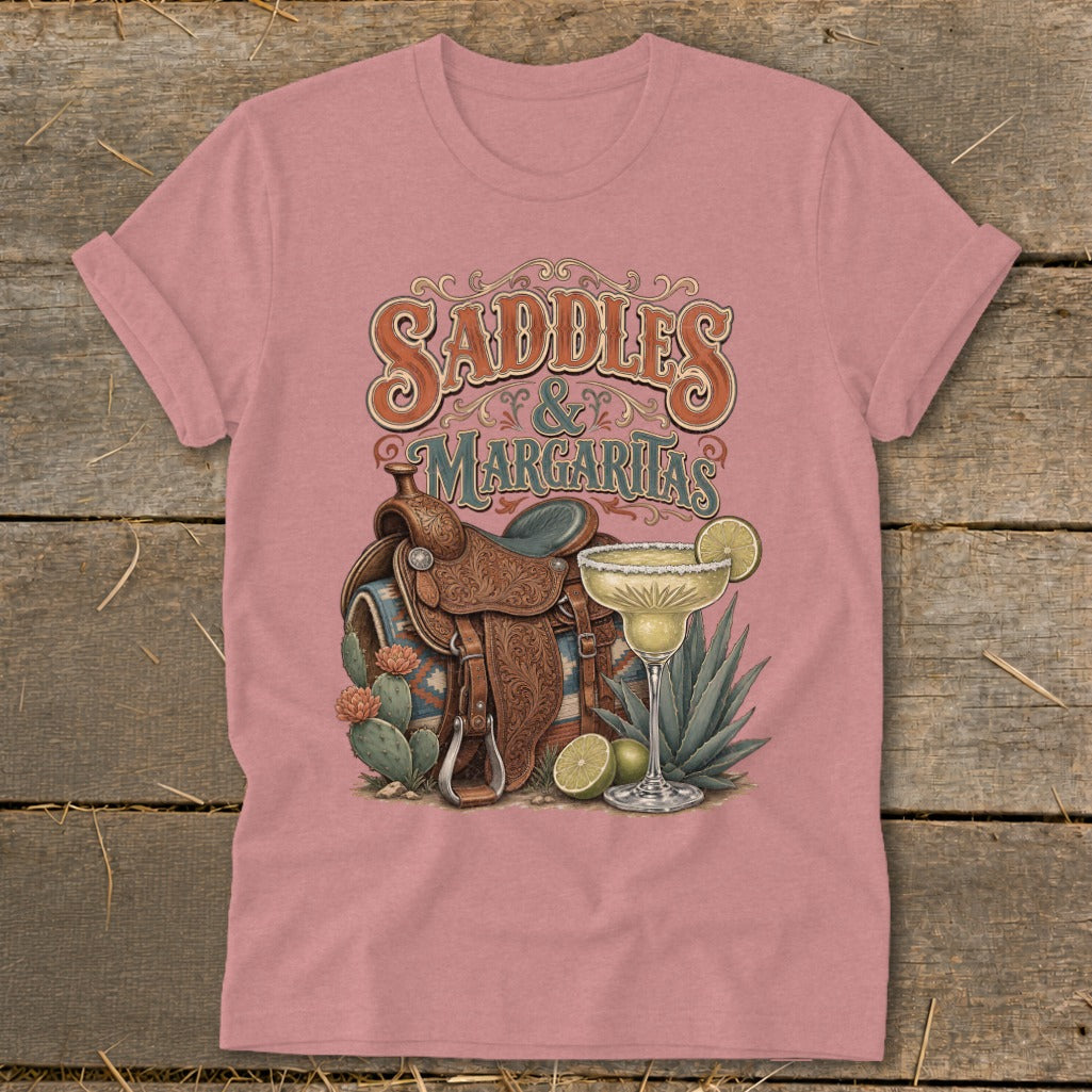 Saddles and Margaritas graphic on a pink t-shirt.