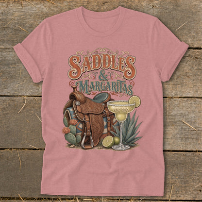 Saddles and Margaritas graphic on a pink t-shirt.