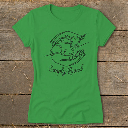 Green t-shirt with black line drawing of a lamb in cupped hands and text "Simply Loved".