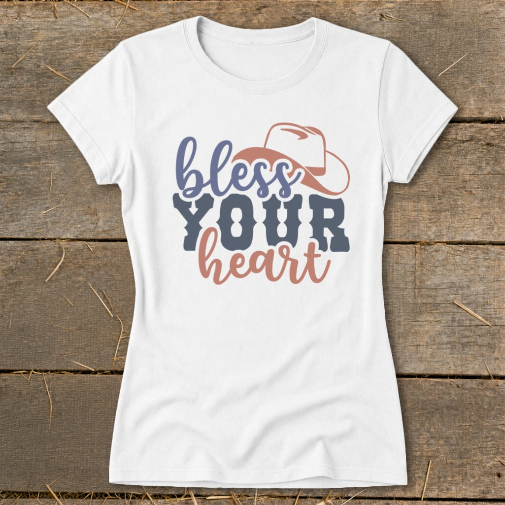 White t-shirt with "bless YOUR heart" and a cowboy hat graphic.