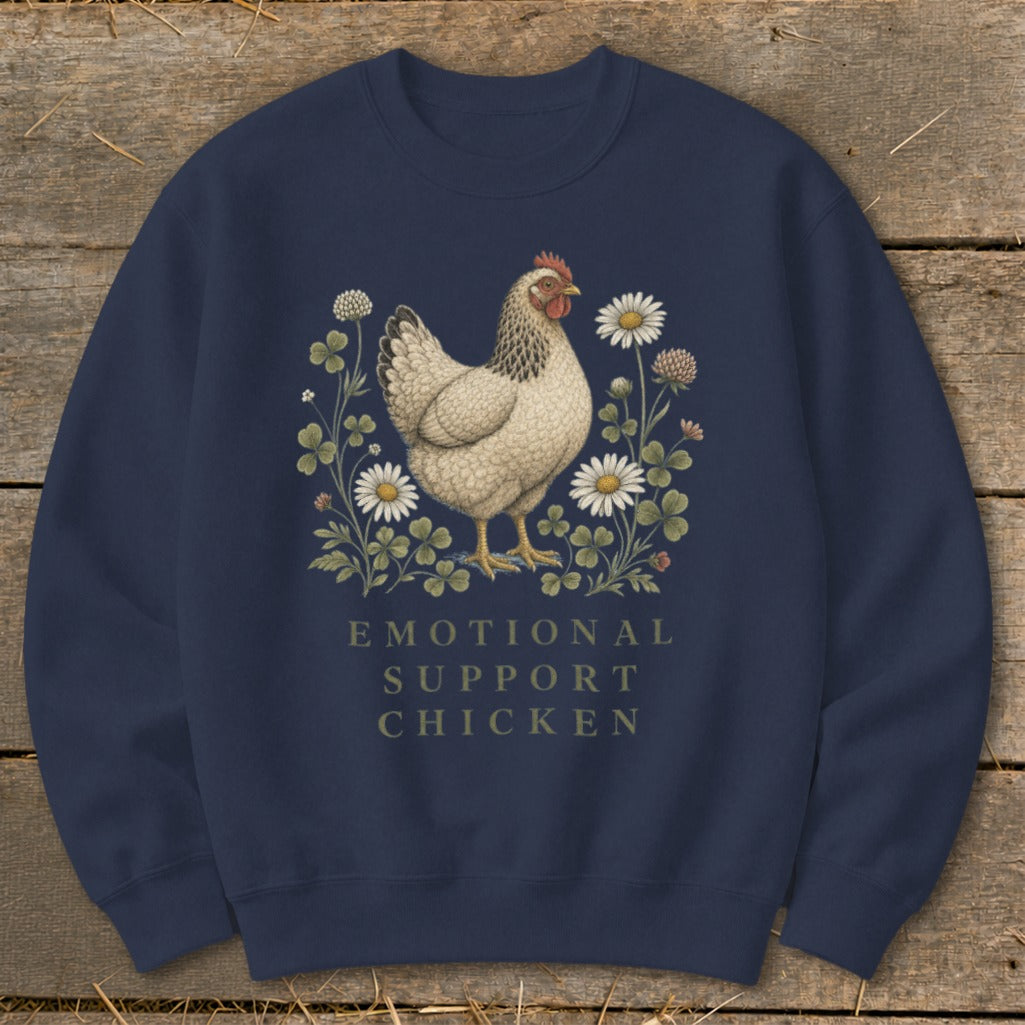 Navy sweatshirt with a white chicken illustration surrounded by clover and daisies, text reads "Emotional Support Chicken".