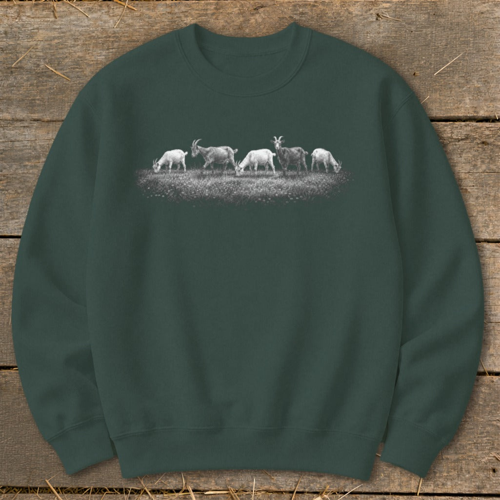 Crewneck sweatshirt with a black and white illustration of five goats grazing in a field.