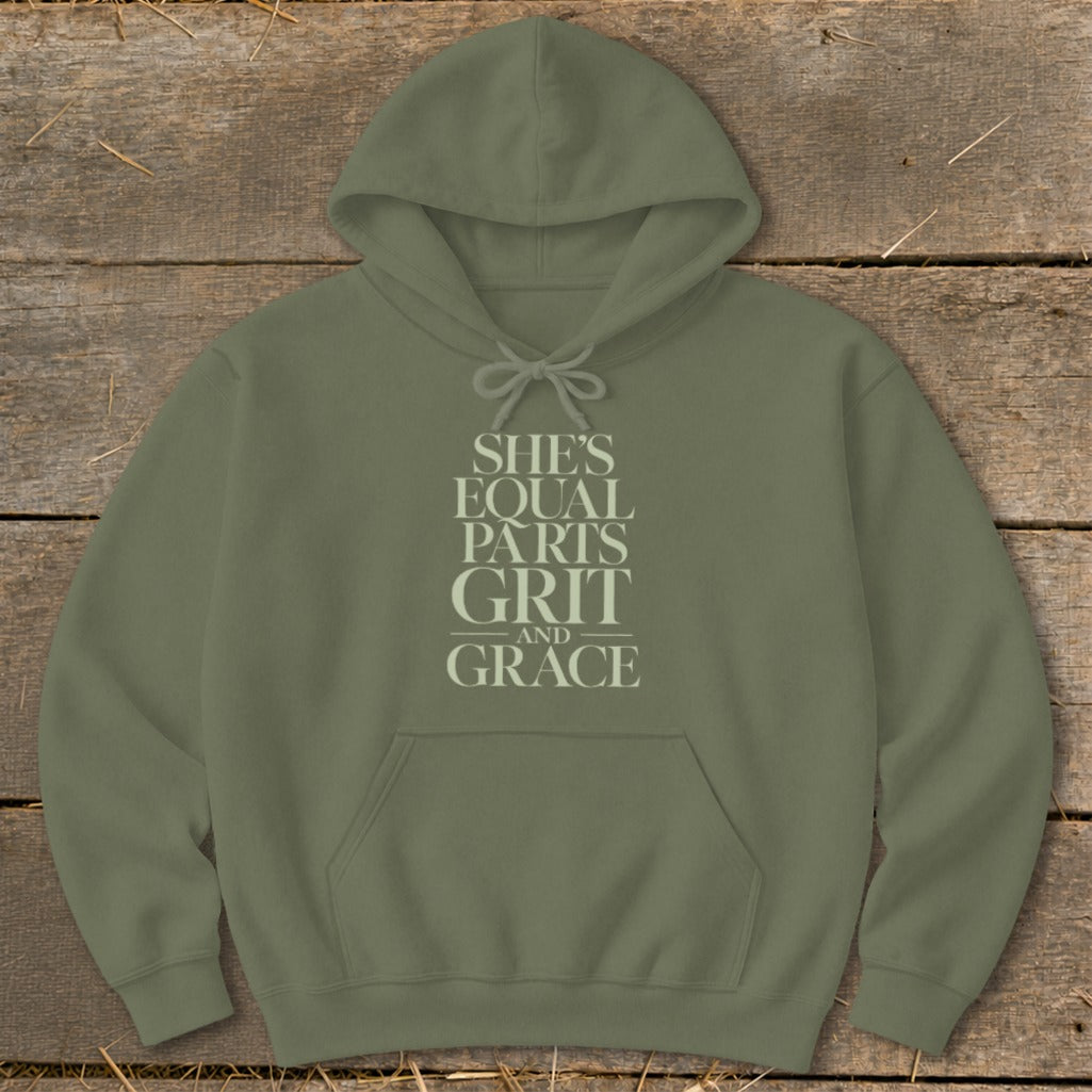 Olive green hoodie with "She's Equal Parts Grit and Grace" text.