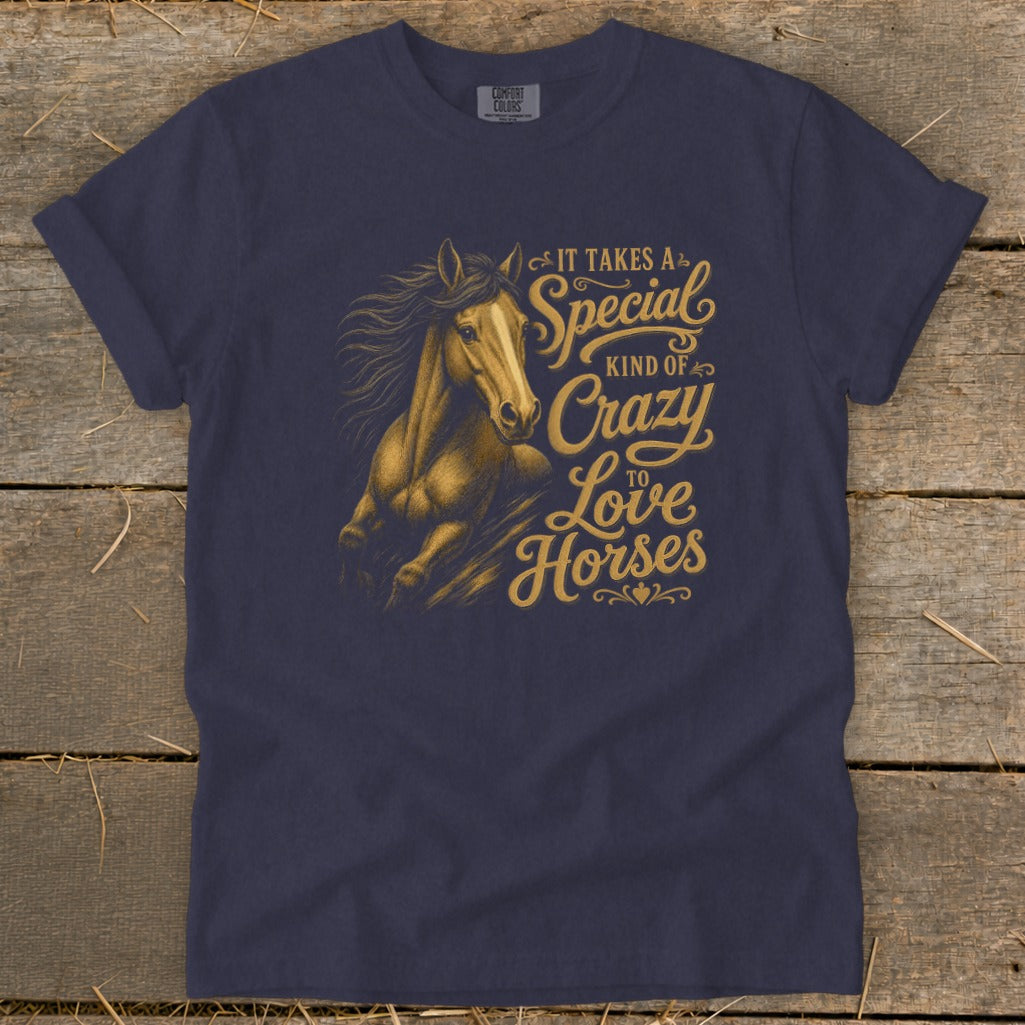 Navy t-shirt with gold distressed graphic of a horse and text "It Takes A Special Kind Of Crazy To Love Horses".