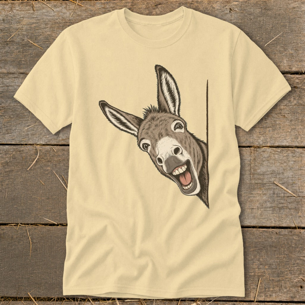 T-shirt with a cartoon donkey peeking around a corner with a wide grin.