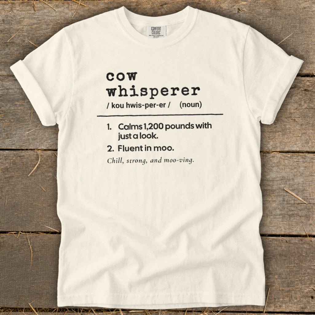 White t-shirt with "Cow whisperer" definition: calms 1,200 pounds, fluent in moo.