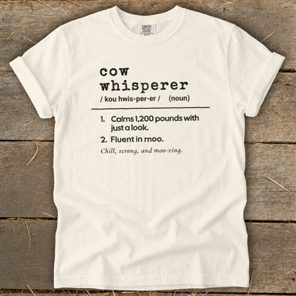 White t-shirt with "Cow whisperer" definition: calms 1,200 pounds, fluent in moo.