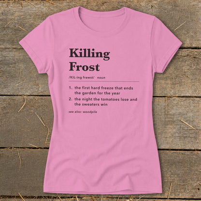 Pink women's t-shirt printed with a dictionary-style definition of killing frost on a wooden background.
