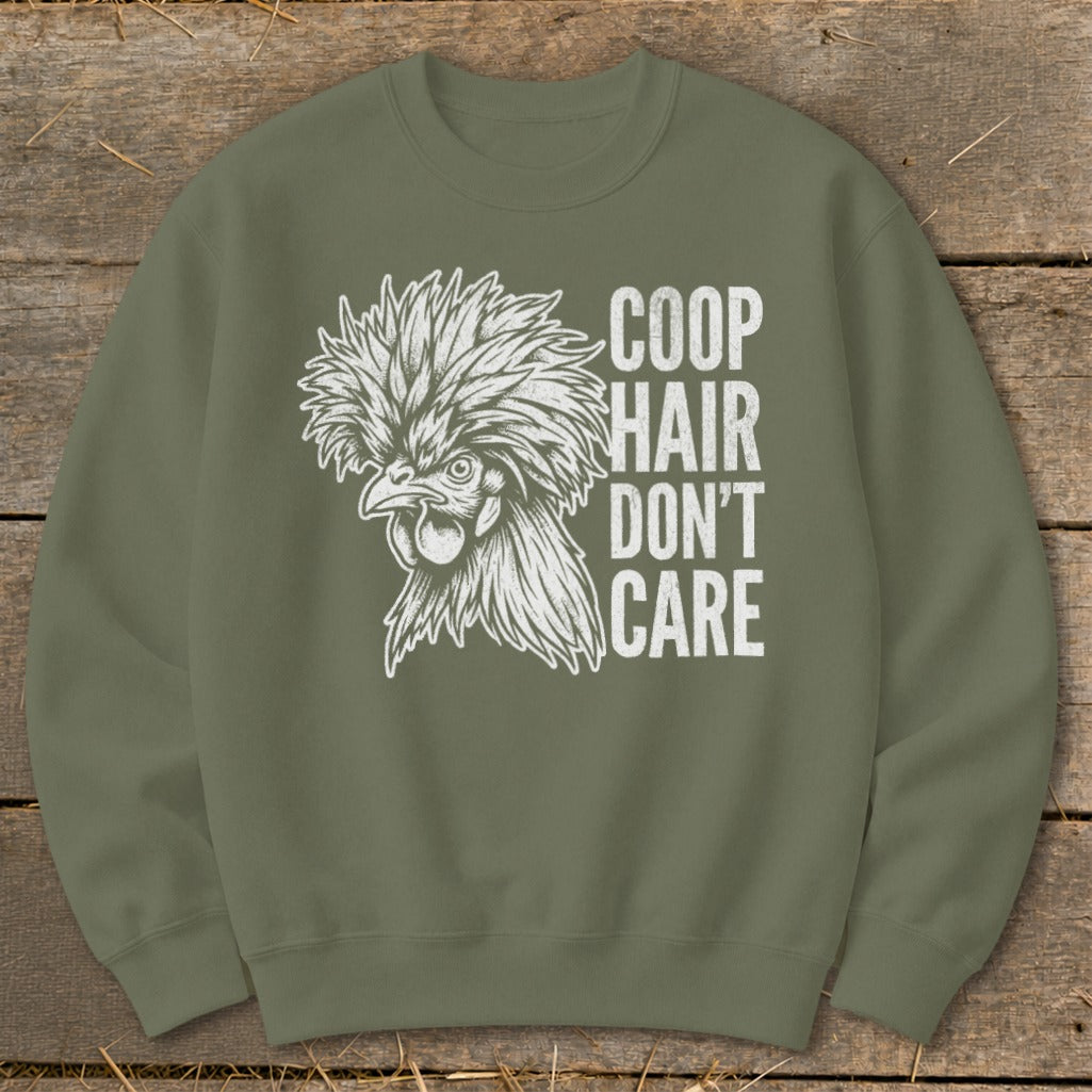 Olive green sweatshirt with white text and chicken illustration: "Coop Hair Don't Care."