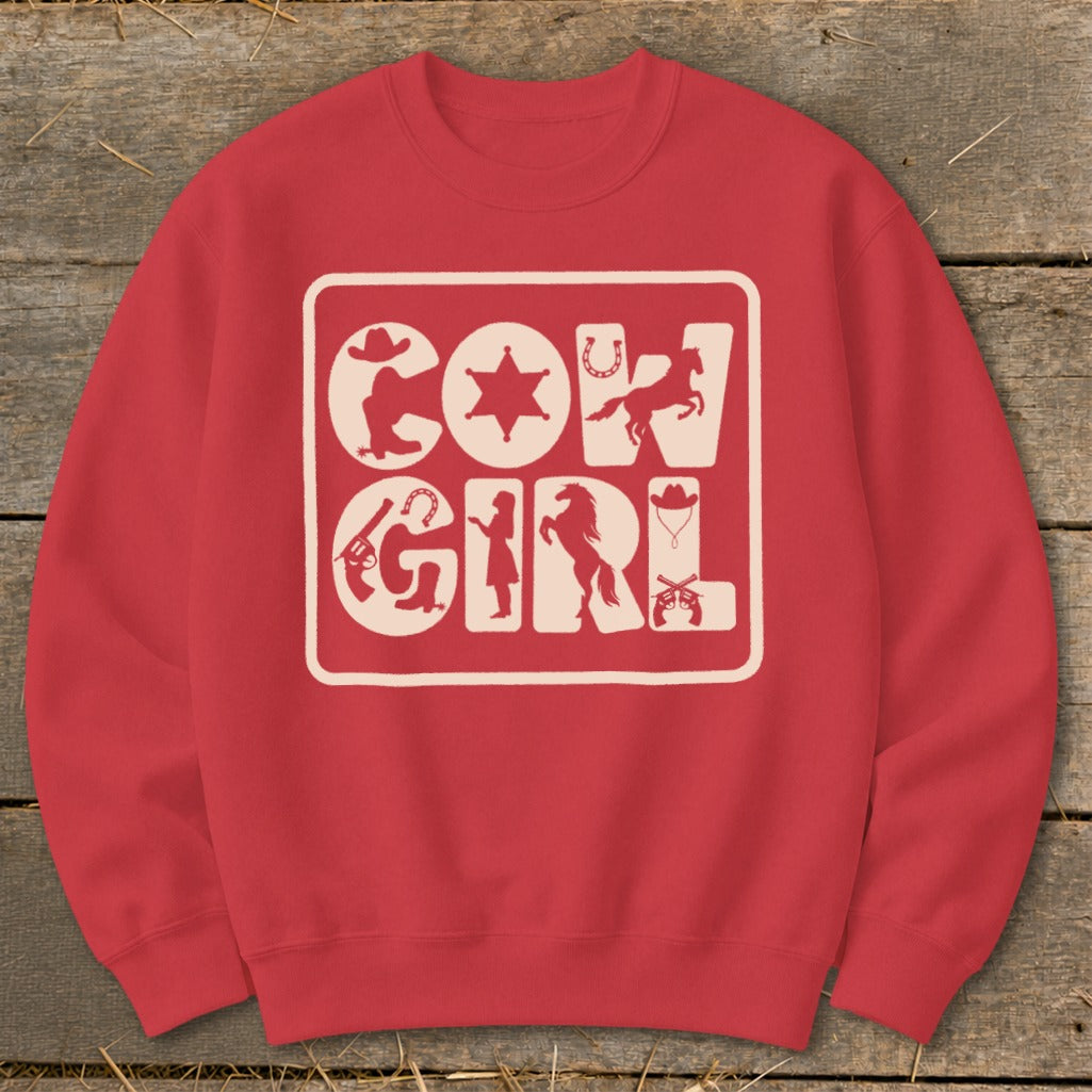 Red sweatshirt with "COWGIRL" text and western icons in cream silhouette.