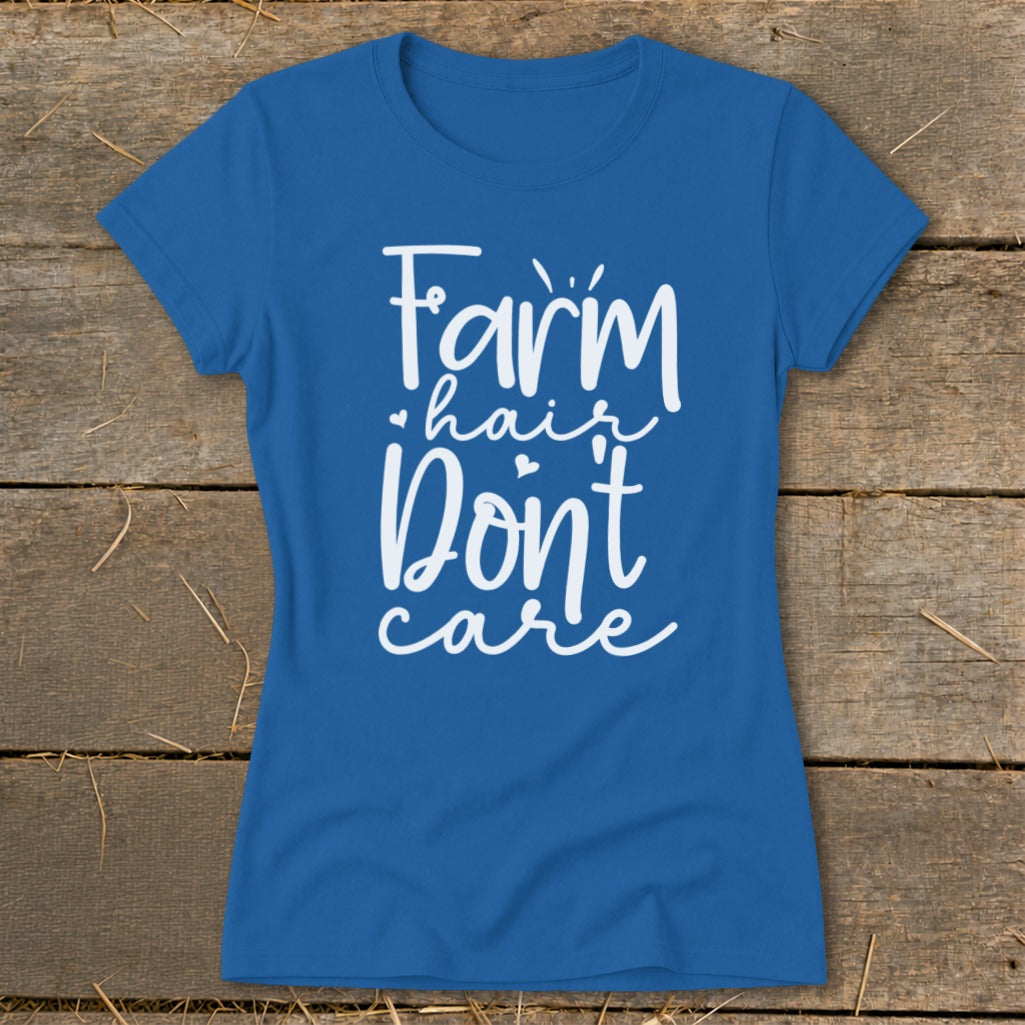 Blue t-shirt with white text reading "Farm hair Don't care".