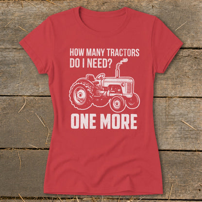Red t-shirt with distressed white text and tractor graphic: "HOW MANY TRACTORS DO I NEED? ONE MORE"