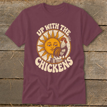 Maroon t-shirt featuring a retro graphic of a sun, rooster, and the text Up With The Chickens.