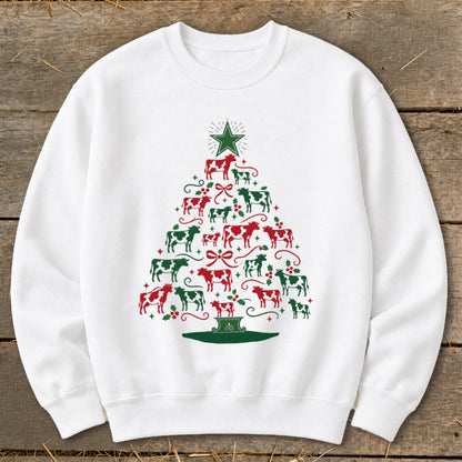 White sweatshirt with a Christmas tree shape made of red and green cows.