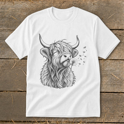 White t-shirt with a sketch of a Highland cow blowing a dandelion