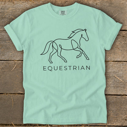 Mint green t-shirt with a line drawing of a horse and the word EQUESTRIAN.