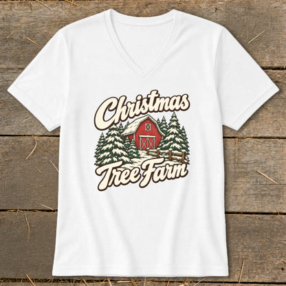 White v-neck t-shirt with "Christmas Tree Farm" text and barn illustration.