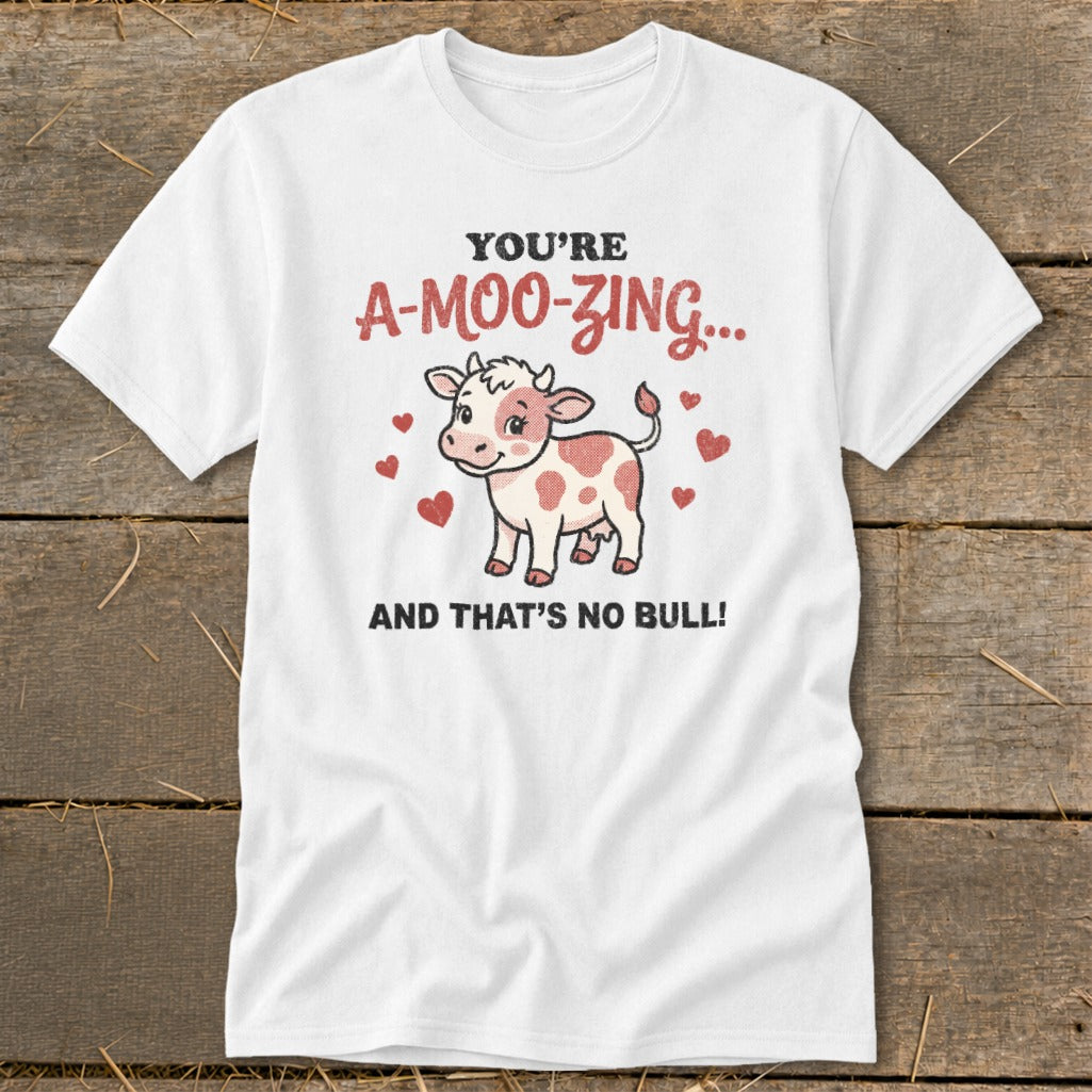 White t-shirt with cartoon cow and text "You're A-Moo-Zing... And That's No Bull!"