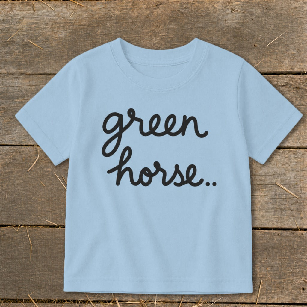 Light blue t-shirt with black cursive text "green horse..".