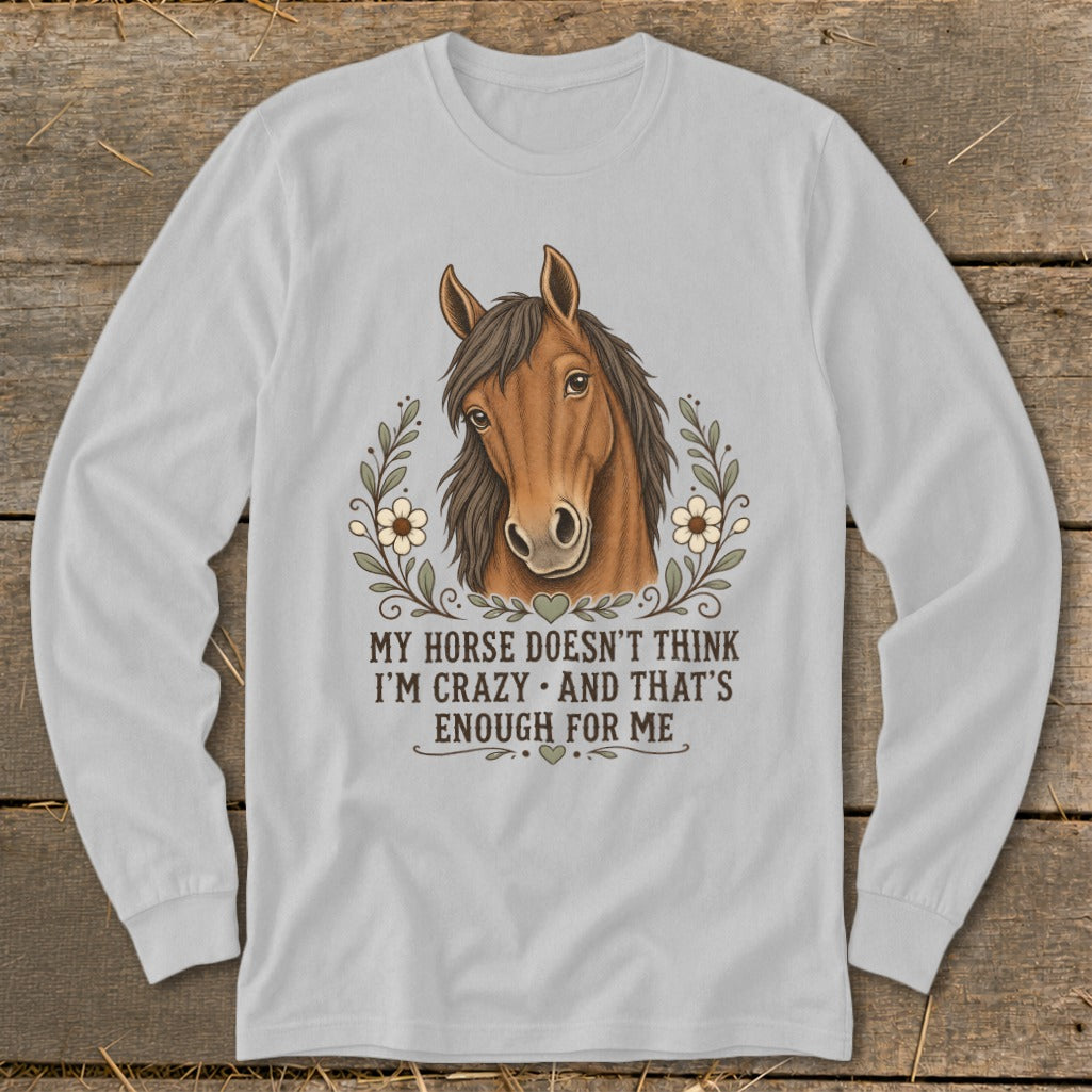 Long-sleeve shirt with a horse illustration and text: "My horse doesn't think I'm crazy."