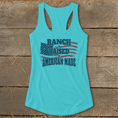 Teal tank top with "RANCH RAISED AMERICAN MADE" text over American flag graphic.
