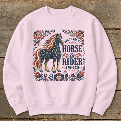 Pink sweatshirt with American flag horse design and text: "250 Years of Horse & Rider 1776-2026".