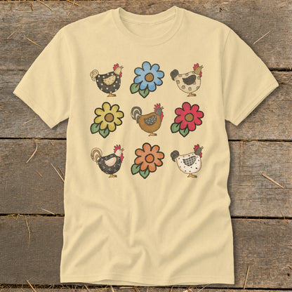 Light yellow t-shirt with a grid of nine farm-themed illustrations of chickens and flowers.