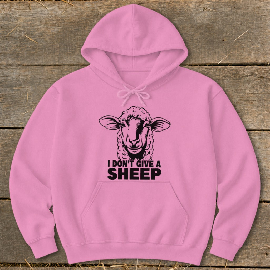 Pink hoodie with a black sheep graphic and "I DON'T GIVE A SHEEP" text.