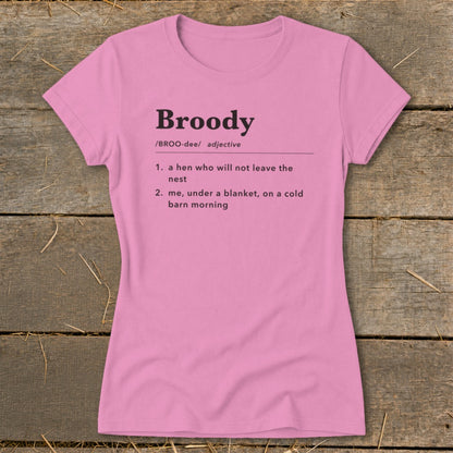 Pink t-shirt with "Broody" definition: "a hen who will not leave the nest" and "me, under a blanket, on a cold barn morning."