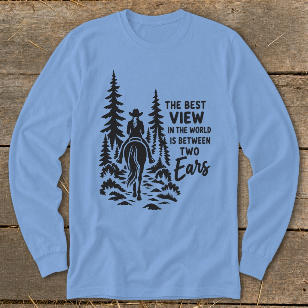 Light blue long-sleeve t-shirt with a black graphic of a horseback rider and pine trees.