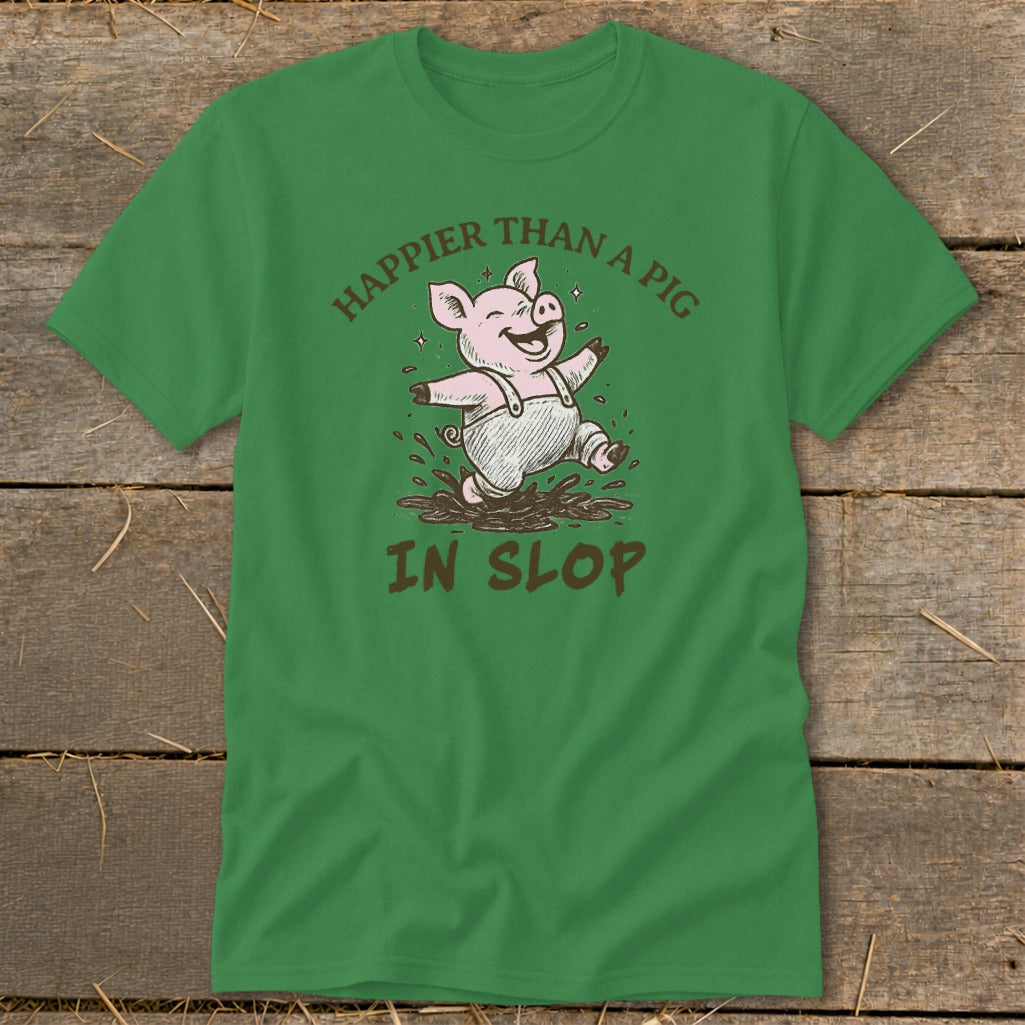 Green t-shirt with a cartoon pig jumping in mud, reads "Happier than a pig in slop".