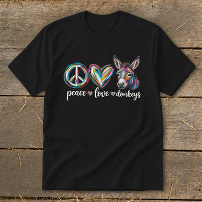 Black t-shirt with a peace sign, colorful heart, and donkey graphic above text.