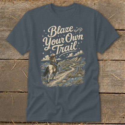 T-shirt with "Blaze Your Own Trail" text and a woman riding a horse on a desert path.