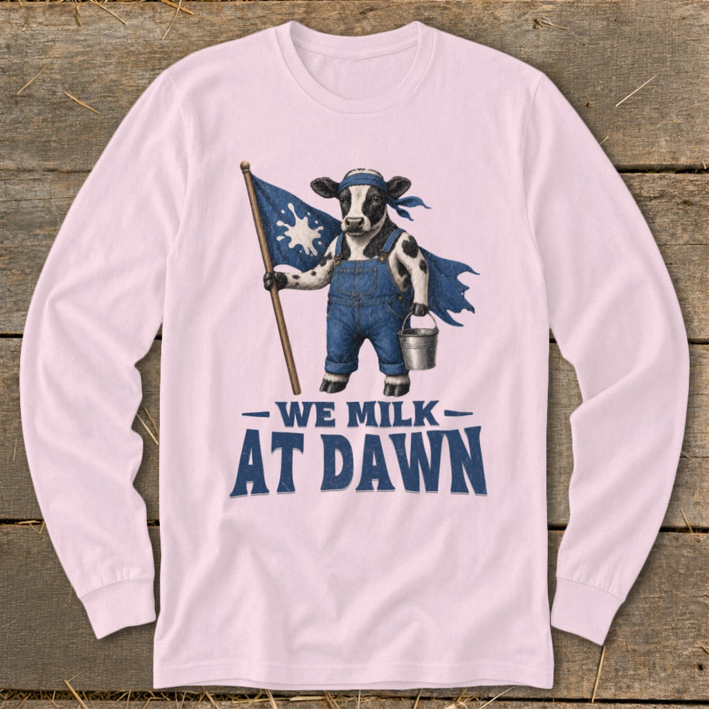 Cow in overalls and cape holding flag and bucket, text "WE MILK AT DAWN".