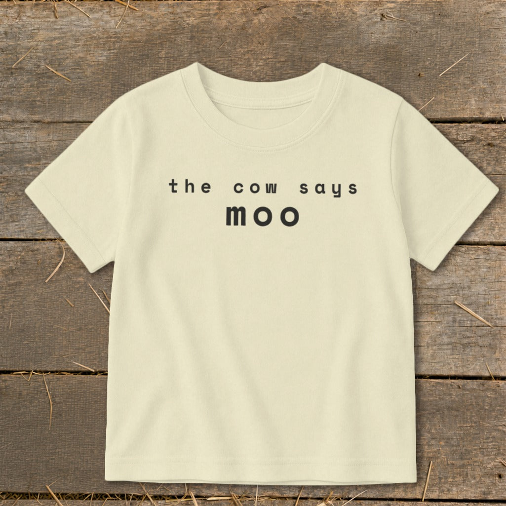 Cream t-shirt with black text "the cow says moo".