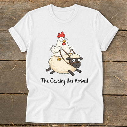White t-shirt with cartoon chicken riding a sheep, text reads "The Cavalry Has Arrived".