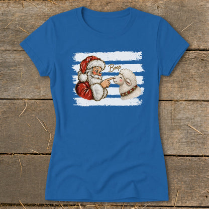Santa boops a sheep with "Boop" text on a blue t-shirt.